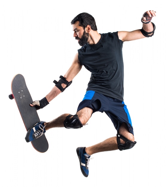 Man with skateboard jumping