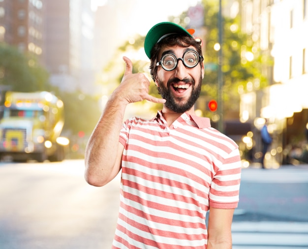 Free photo man with a telephone made with his hands