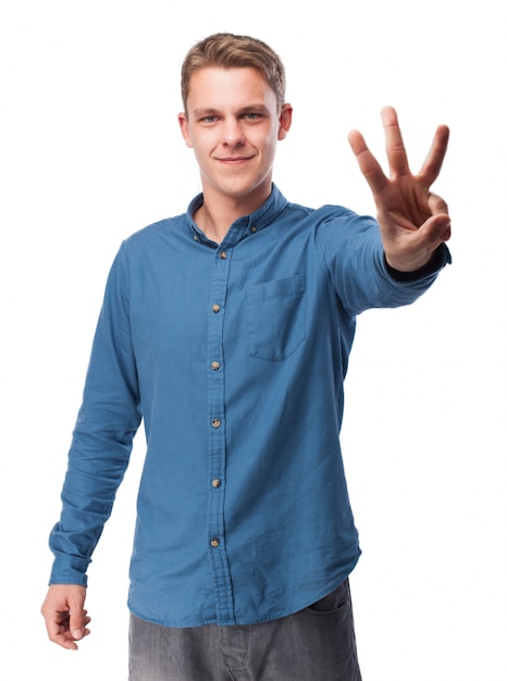 Man with three raised fingers