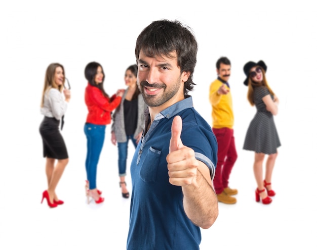 Man with thumb up over white background