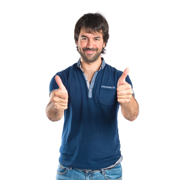 Man with thumb up over white background