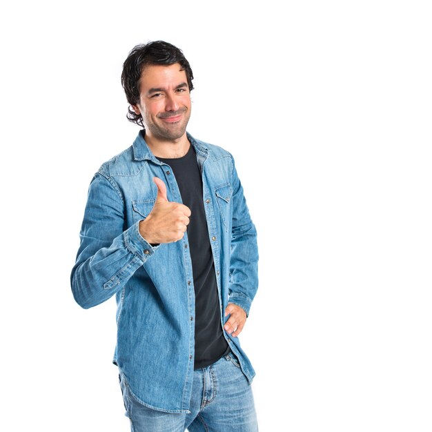 Man with thumb up over white background