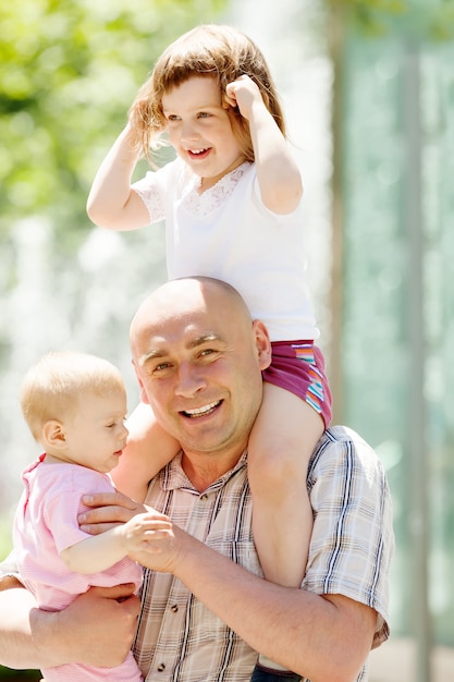 man with two children