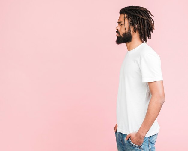 Man with a white tshirt posing