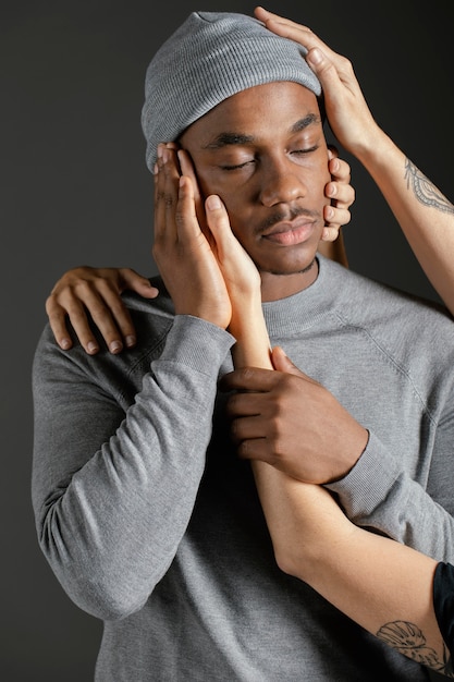 Free photo man with woman hand comforting him