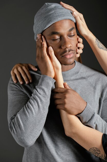 Man with woman hand comforting him