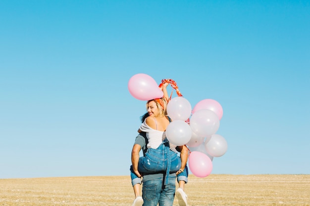 Man with woman on his back