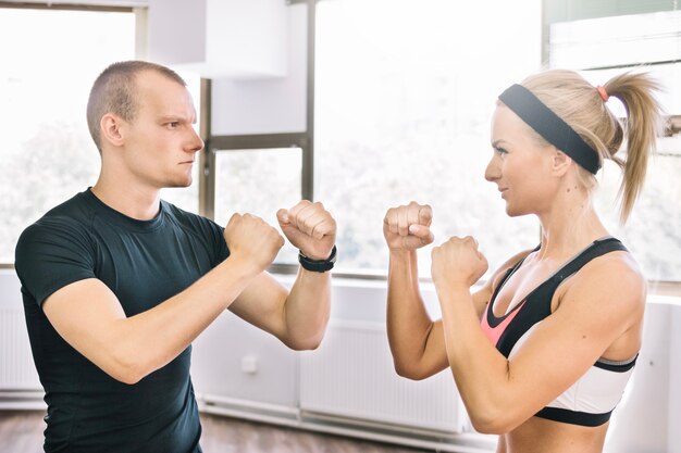 Man and woman in boxing position
