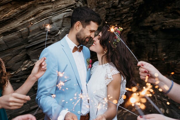 Man and woman celebrating their wedding at the beach