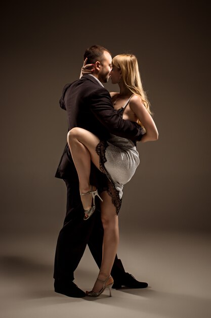 Man and woman dancing argentinian tango