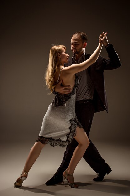 Man and woman dancing argentinian tango