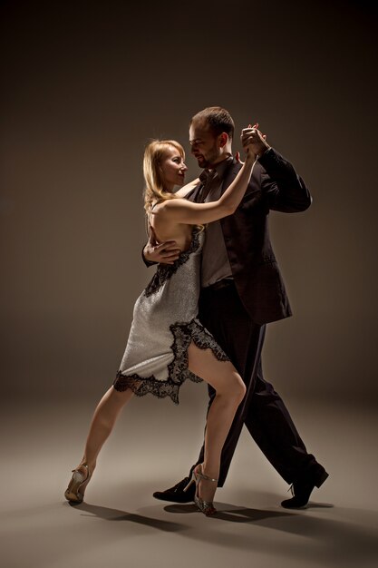 The man and the woman dancing argentinian tango
