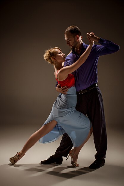 The man and the woman dancing argentinian tango