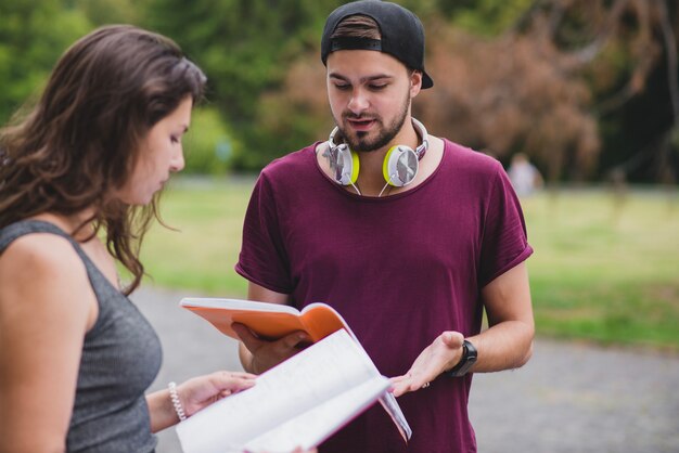 Man and woman discussing material