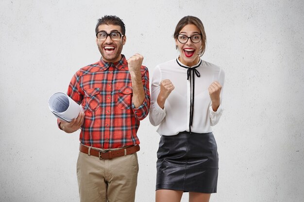 Man and woman dressed formally