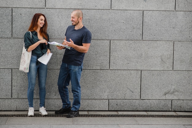 Man and woman having fun standing