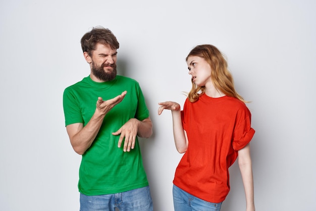 Man and woman hug friendship colorful tshirts family studio lifestyle