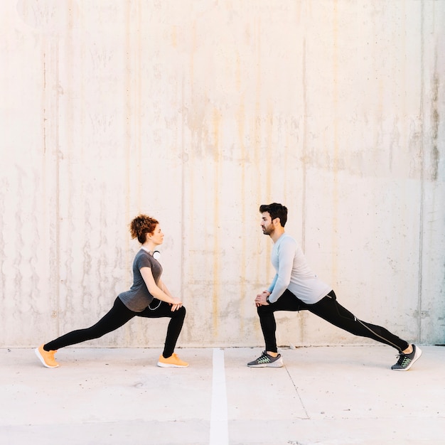 Man and woman lunging together