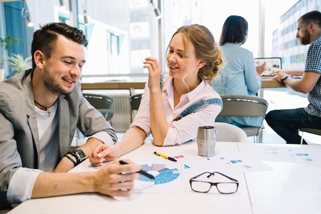 Man and woman in office