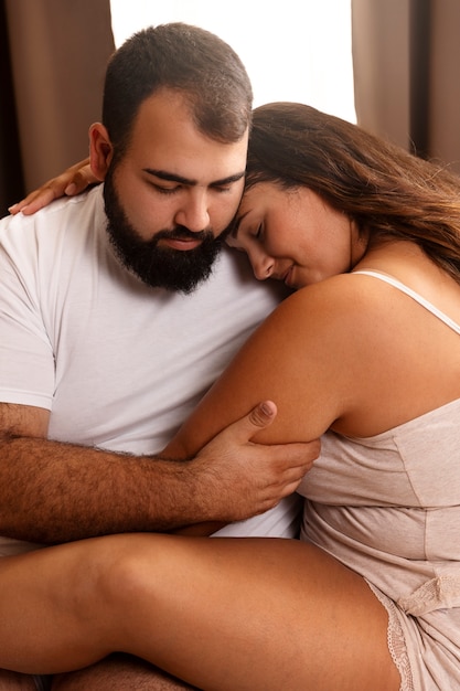 Man and woman posing together medium shot