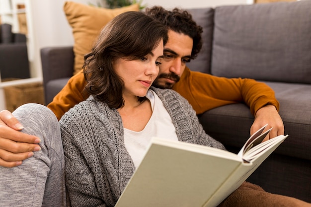 Man and woman reading together