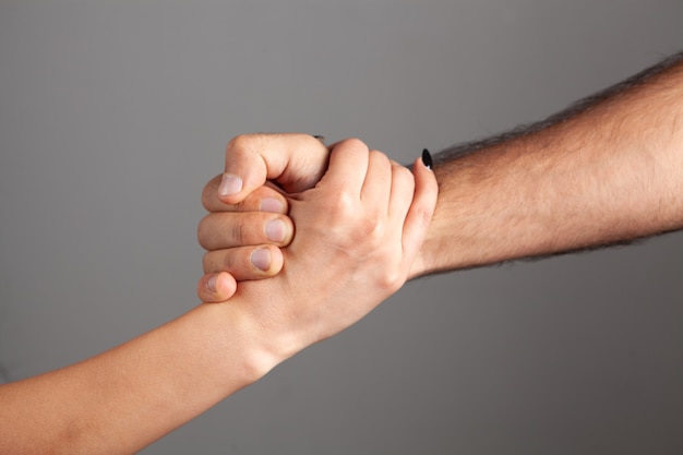 Man and woman shake hands