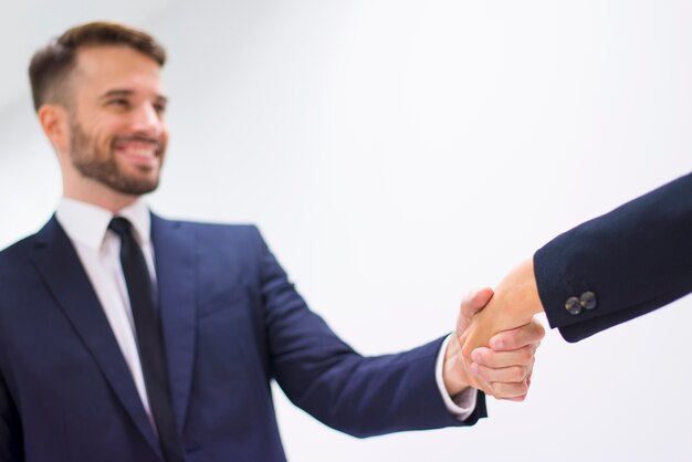 Man and woman shaking hands