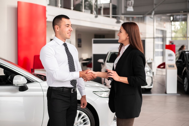 Man and woman shaking hands