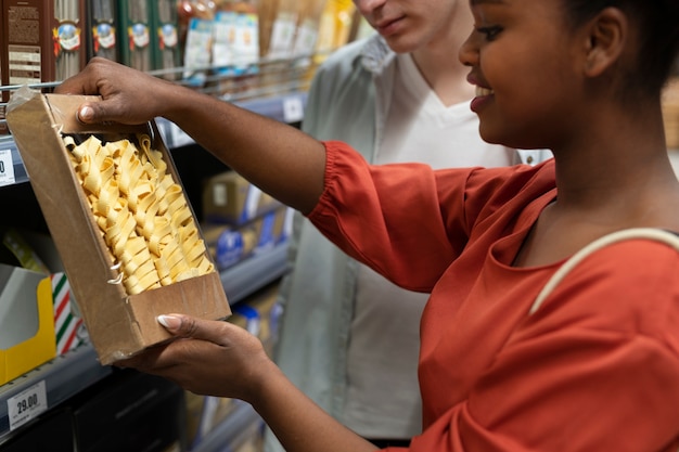 Man and woman shopping at the grocery store