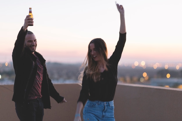 Man and woman with beer