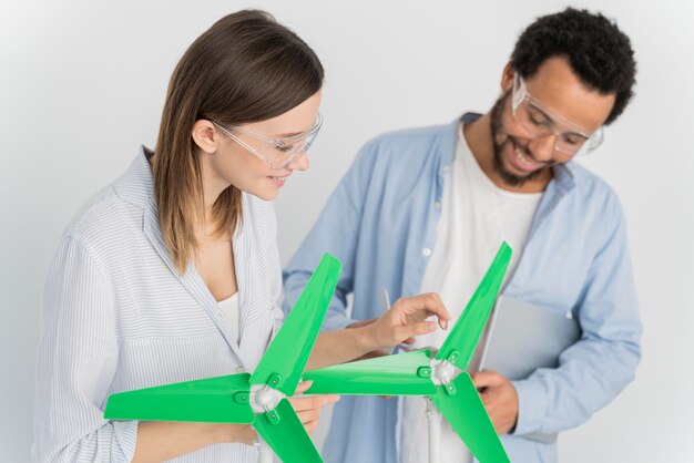 Man and woman working on energy innovations