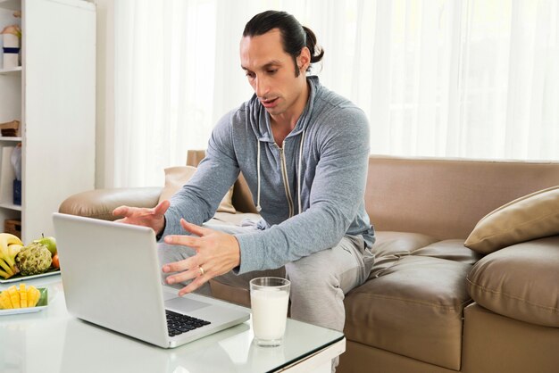 Man working as a freelancer at home