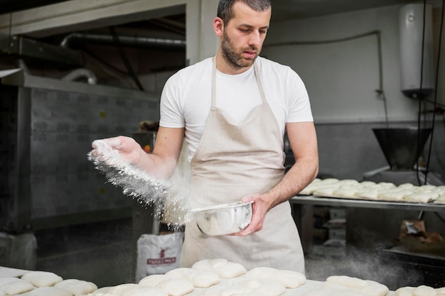 Man working in a bread bakery