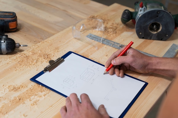 Man working on cutting mdf board