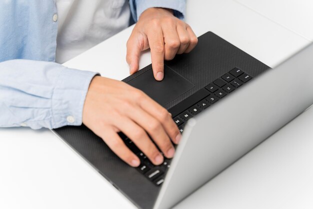 Man working on energy innovations on his laptop