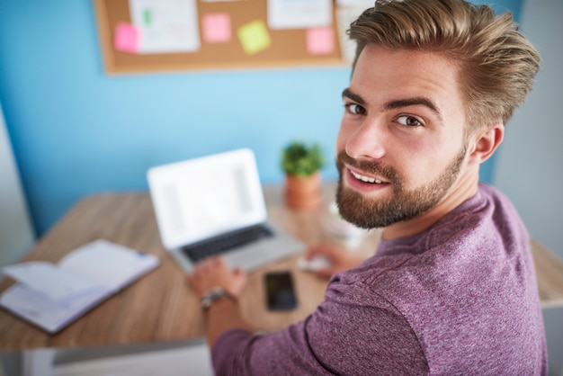 Free photo man working in home office