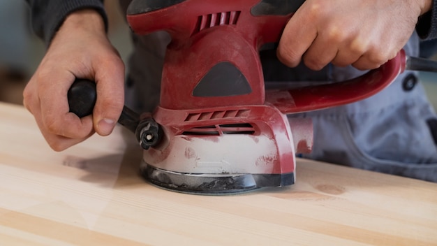 Free photo man working in a mdf boards warehouse