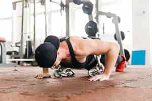 Free photo man working out in the gym