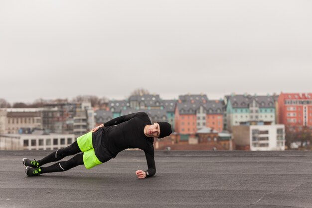 Man working out in urban environment