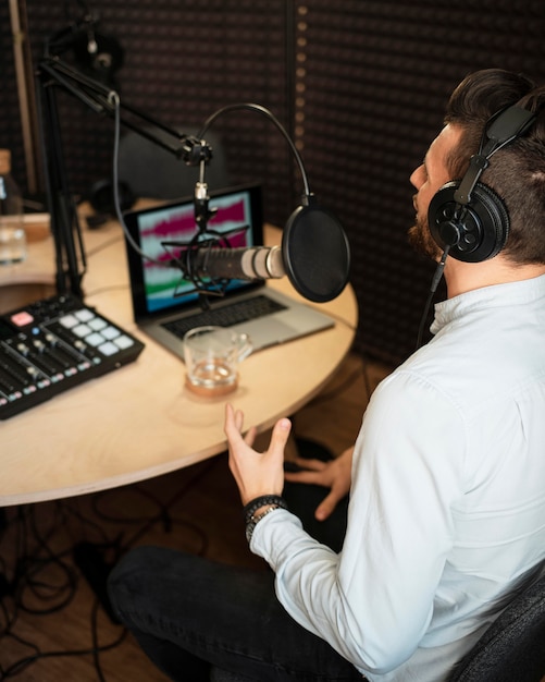 Man working at radio station high angle