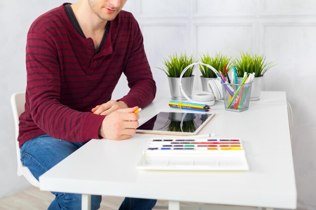 Man Working On Tablet