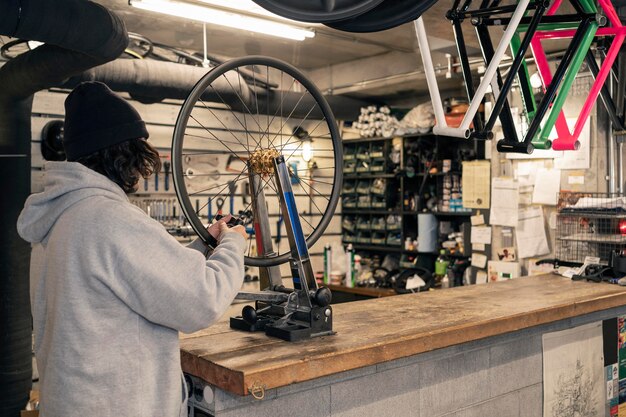 Man working on wheel in service