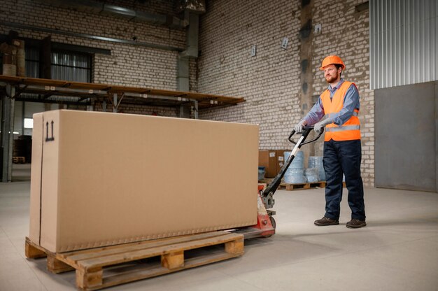 Man working with heavy box