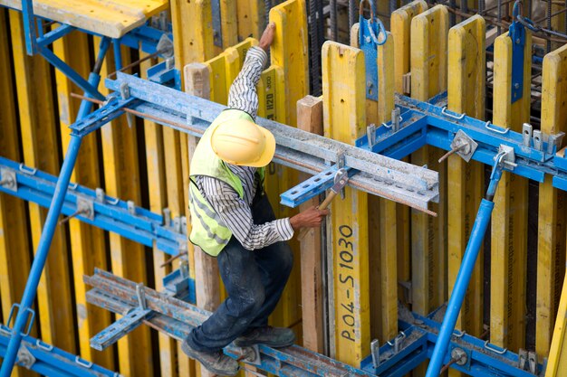 Man working with safety helmet