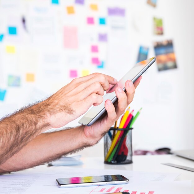 Man working with a tablet in a office