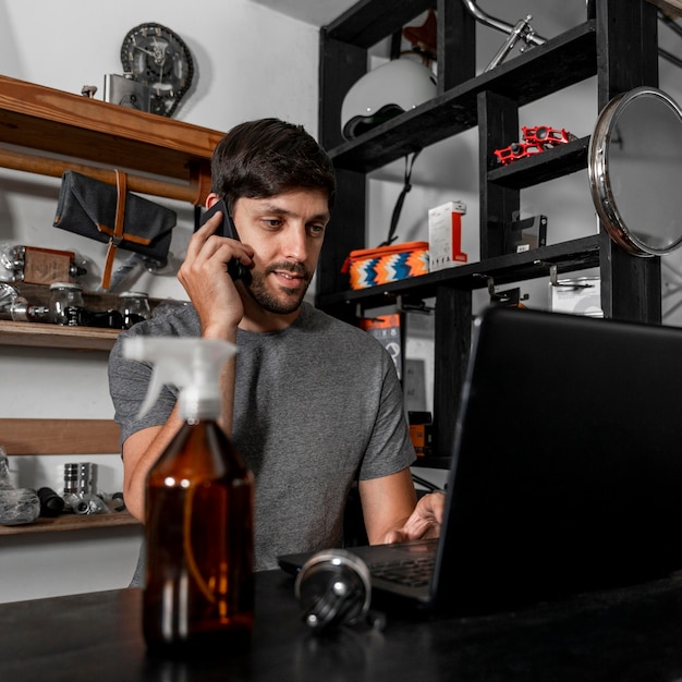 Man in workshop creating bike