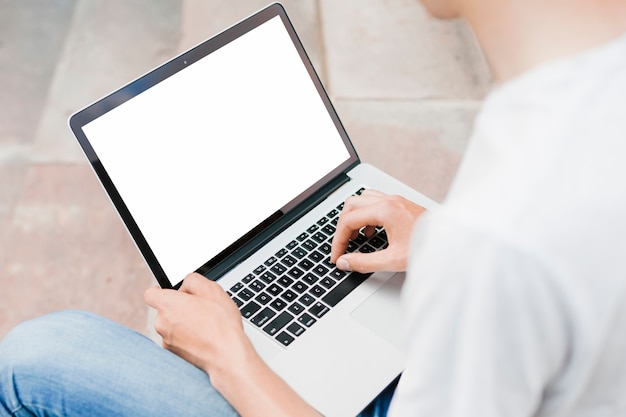 Man writing on the laptop topview