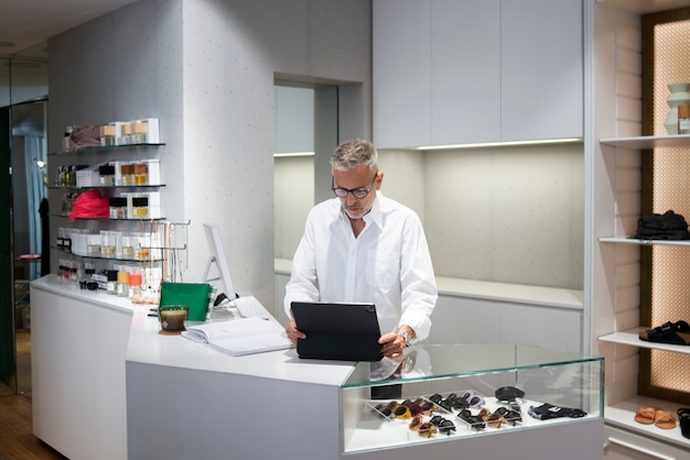 Manager preparing the store for reopening