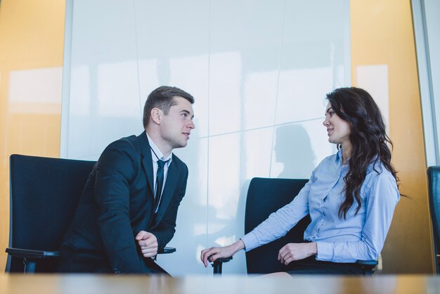 Managers talking in office