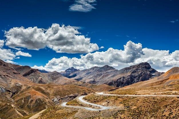 Download Free Tourists Relaxing On The Summit Of The Tanglang La Pass Is The Use our free logo maker to create a logo and build your brand. Put your logo on business cards, promotional products, or your website for brand visibility.